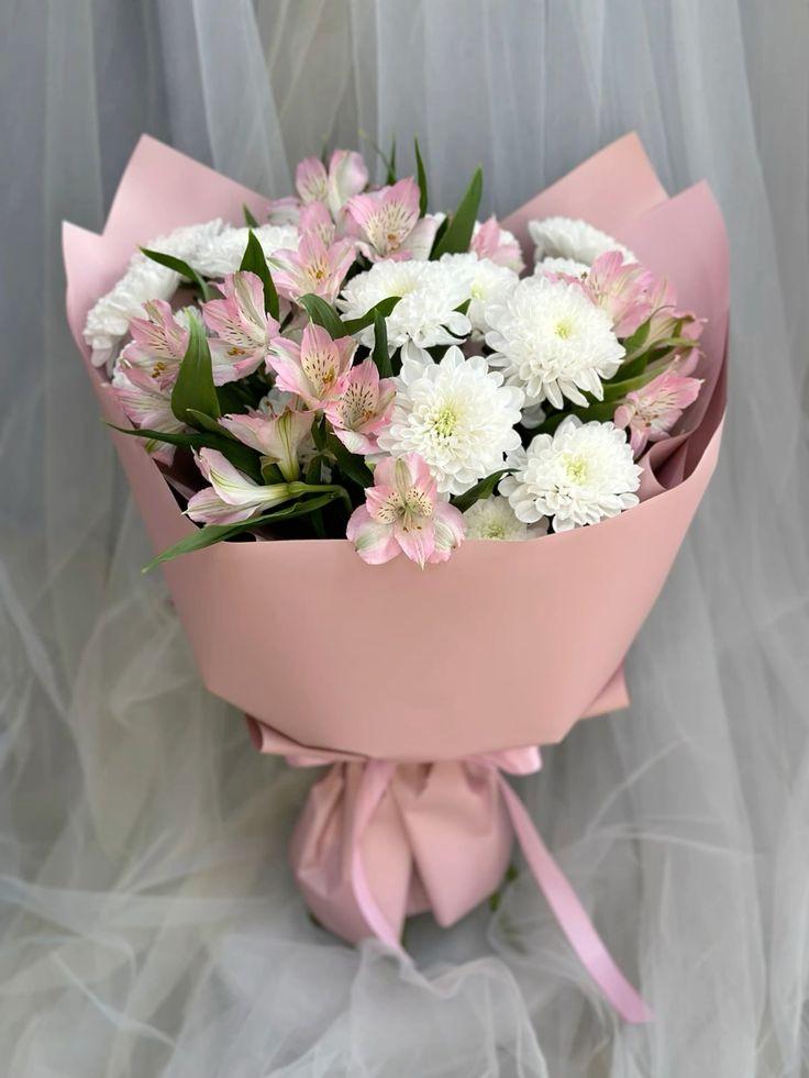 Corporate meeting room with carefully timed floral arrangements that maintain elegance throughout business hours